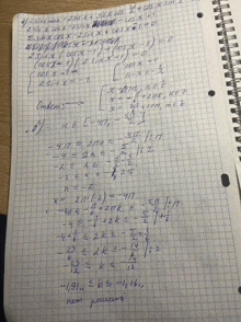 a math problem is written in russian on a piece of paper