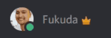 a blurred image of a man with the name fukuda below it