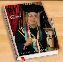 a book titled the history of the legend has a picture of a man in a graduation cap and gown on the cover