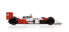 a red and white race car with the number 12 on the side