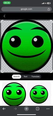 a green smiley face is on a phone screen