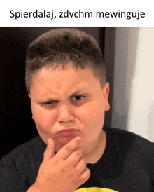 a young boy making a funny face with the words spierdalaj zdvchm mewinguje above him