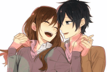 a boy and a girl are hugging each other with the girl laughing