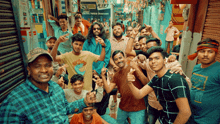 a group of young men are posing for a picture in front of a store that says raft