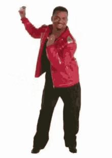 a man in a red jacket is dancing with the words `` happy dancing '' written below him .