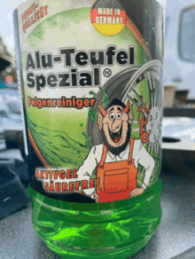 a bottle of alu-teufel spezial has a cartoon devil on the label