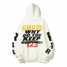 a white hoodie that says fear of god on the back