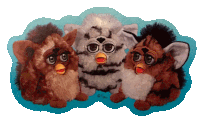 three furby toys are sitting on a blue background