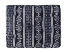 a blanket with a blue and white geometric pattern