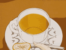 a cup of tea on a saucer with a slice of lemon and a spoon .