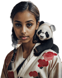 a woman in a kimono holds a stuffed panda bear on her shoulder