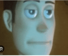 a close up of a toy story character 's face with the website .com in the corner