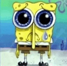 a cartoon of spongebob squarepants with big eyes and a tear coming out of his nose .