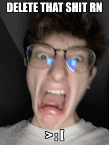 a young man wearing glasses is making a funny face with the words delete that shit rn above him