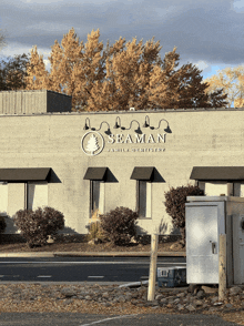 a seaman family dentistry building with a sign on the side