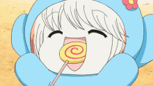 a cartoon character with a lollipop in her mouth and a flower on her head