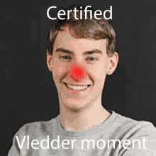 a young man with a red nose and the words certified vledder moment on the bottom