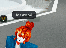 a girl with red hair is standing in front of a screen that says " fasszopo "