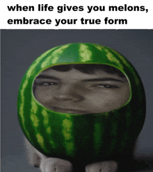 a watermelon with a man 's face inside of it