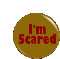 a button that says i 'm scared in red on a brown background