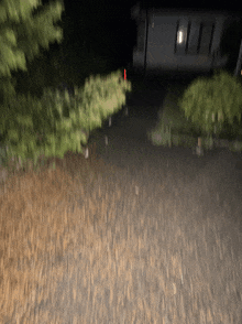 a blurred image of a house at night