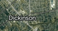 an aerial view of a city with the name dickinson on it