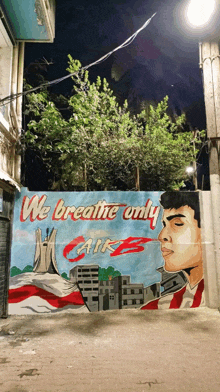 a mural on a wall says we breathe only cairo