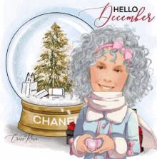 a girl is standing in front of a snow globe that says chanel on it