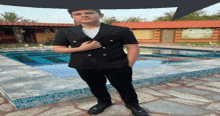 a man in a black suit is standing in front of a pool