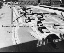 a black and white photo of a snow covered highway with a caption that says everyone in 2021 yay a better year texas