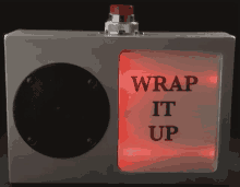 a box that says wrap it up with a red light behind it