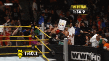 a wrestling ring with a sign that says time to beat 1 : 36.9