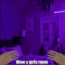 a girl 's room with purple lights and a picture of a unicorn on the wall