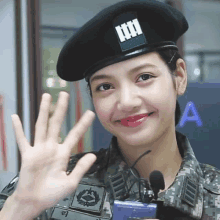 a woman in a military uniform with the letter a in the corner