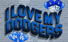 a brick wall with the words `` i love my dodgers '' painted on it