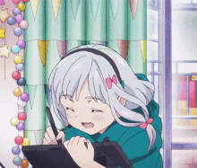 a girl with white hair and a bow on her head is drawing on a tablet