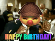 a man in a suit with a clown mask on his face says happy birthday !