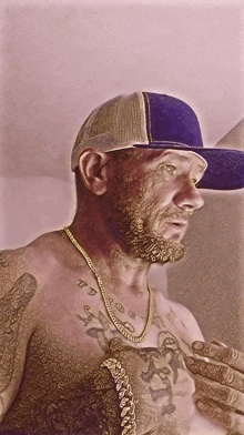 a man without a shirt is wearing a hat and a gold chain around his neck