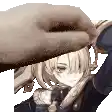 a close up of a person 's hand touching a girl 's face .