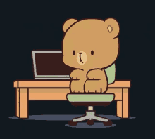 a teddy bear is sitting in an office chair in front of a laptop computer .