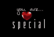 a red heart is on a black background with the words `` you are special '' written above it .