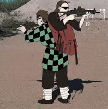 two people are standing next to each other holding guns at a shooting range .