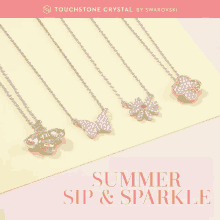 a display of necklaces with the words summer sip and sparkle