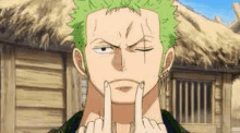 roronoa zoro from one piece is making a funny face with his hands .