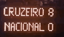 a sign that says cruzeiro 8 nacional o is lit up