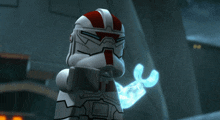 a lego clone trooper is holding a blue wrench in his hand