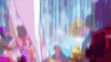 a blurred image of a room with a purple and blue background