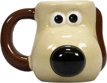 a coffee mug with a dog face on it