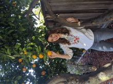 a woman wearing a shirt that says ' i love jesus '