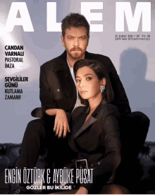 a man and a woman are on the cover of a magazine